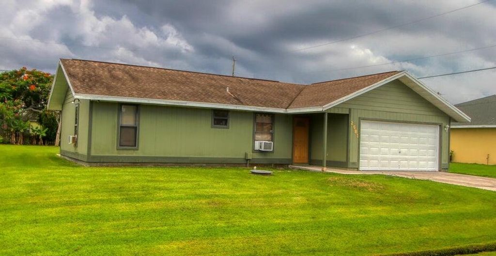 Photo of 2581 SE Robin Circle SE, Port Saint Lucie, FL 34952 (MLS # R11006189)