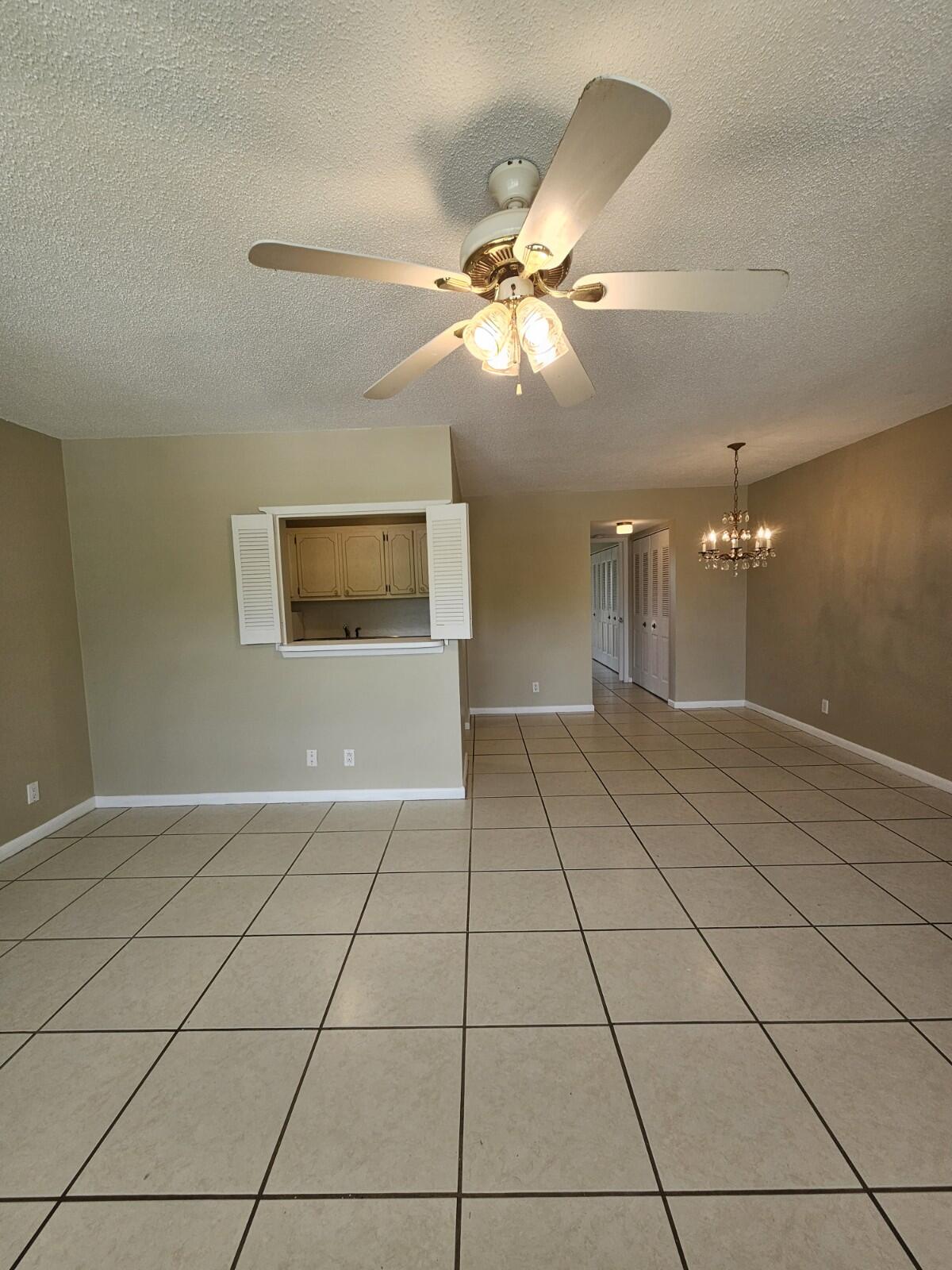 Charming 1-Bed, 1.5-Bath Condo in the Sought-After Century Village 55+ Community!Step into this bright and well-kept unit, ideally located just steps from the community pool. Featuring ceramic tile flooring throughout, freshly painted interiors, and generous closet space, this home offers both comfort and practicality. Additional highlights include a new hard-wired water heater, updated electric panel, and access to newer washers and dryers with extra storage space. The bathrooms feature comfort-height toilets for added ease. Century Village is a gated 55+ community offering monthly indoor and outdoor pest control, tennis courts, and even a private island with a fishing pier. Resort-style living at its finest!