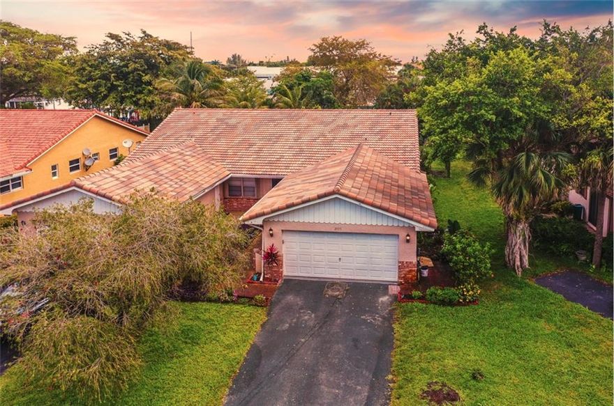 WOW!!!  What a great opportunity to own this 3 bedroom 2 bath home in Coral Springs for only $399K!!!  This home features a spacious, open floor plan with a two car garage.  This well kept home features stainless steel appliances in the kitchen, tile flooring, newer laminate flooring in the bedrooms, and an upgraded master bathroom.  Enjoy the spacious fenced in backyard with a shed for extra storage.  NEW IMPACT HURRICANE PROTECTED WINDOWS THROUGHOUT!!  Zoned for the top schools in Broward, close in proximity to the Coral Springs Performing Arts Center, shopping, dining, and any of your entertainment needs.   You better make an offer on this house before BOOM..............SHE GONE!!!Roof=2013 A/C=2020 Water Heater-2013 WOW!!!  What a great opportunity to own this 3 bedroom 2 bath home in Coral Springs for only $399K!!!  This home features a spacious, open floor plan with a two car garage.  This well kept home features stainless steel appliances in the kitchen, tile flooring, newer laminate flooring in the bedrooms, and an upgraded master bathroom.  Enjoy the spacious fenced in backyard with a shed for extra storage.  NEW IMPACT HURRICANE PROTECTED WINDOWS THROUGHOUT!!  Zoned for the top schools in Broward, close in proximity to the Coral Springs Performing Arts Center, shopping, dining, and any of your entertainment needs.   You better make an offer on this house before BOOM..............SHE GONE!!!Roof=2013 A/C=2020