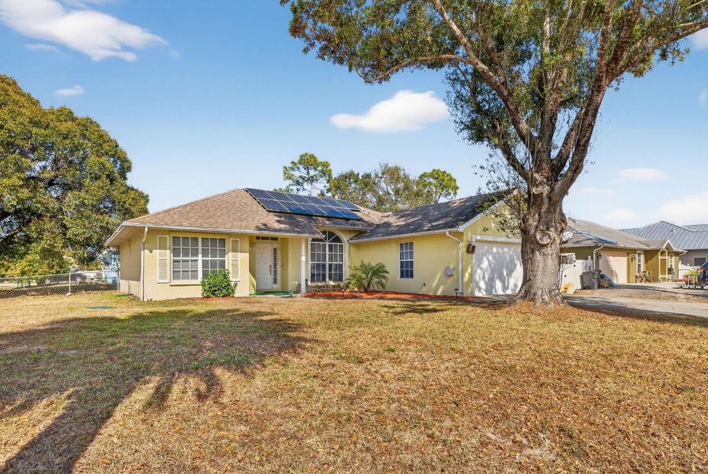 Photo of 1765 SW Desert Avenue, Port Saint Lucie, FL 34953 (MLS # R11157699)