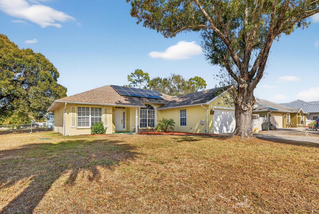 Photo of 1765 SW Desert Avenue, Port Saint Lucie, FL 34953 (MLS # R11157699)