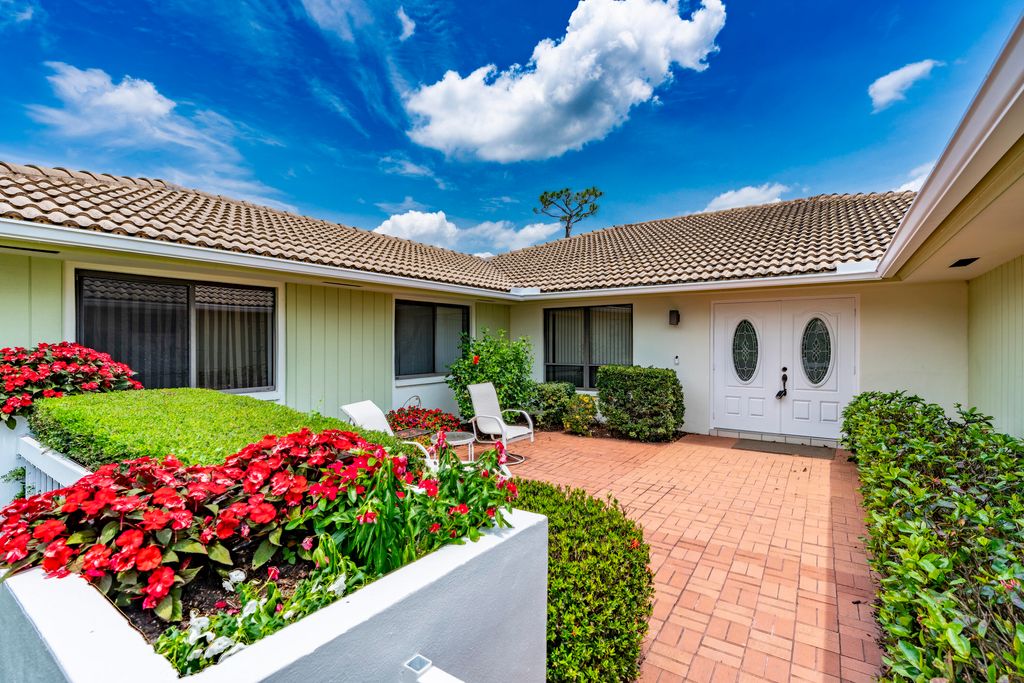 Photo of 1543 SW Troon Circle, Palm City, FL 34990 (MLS # B26029890)
