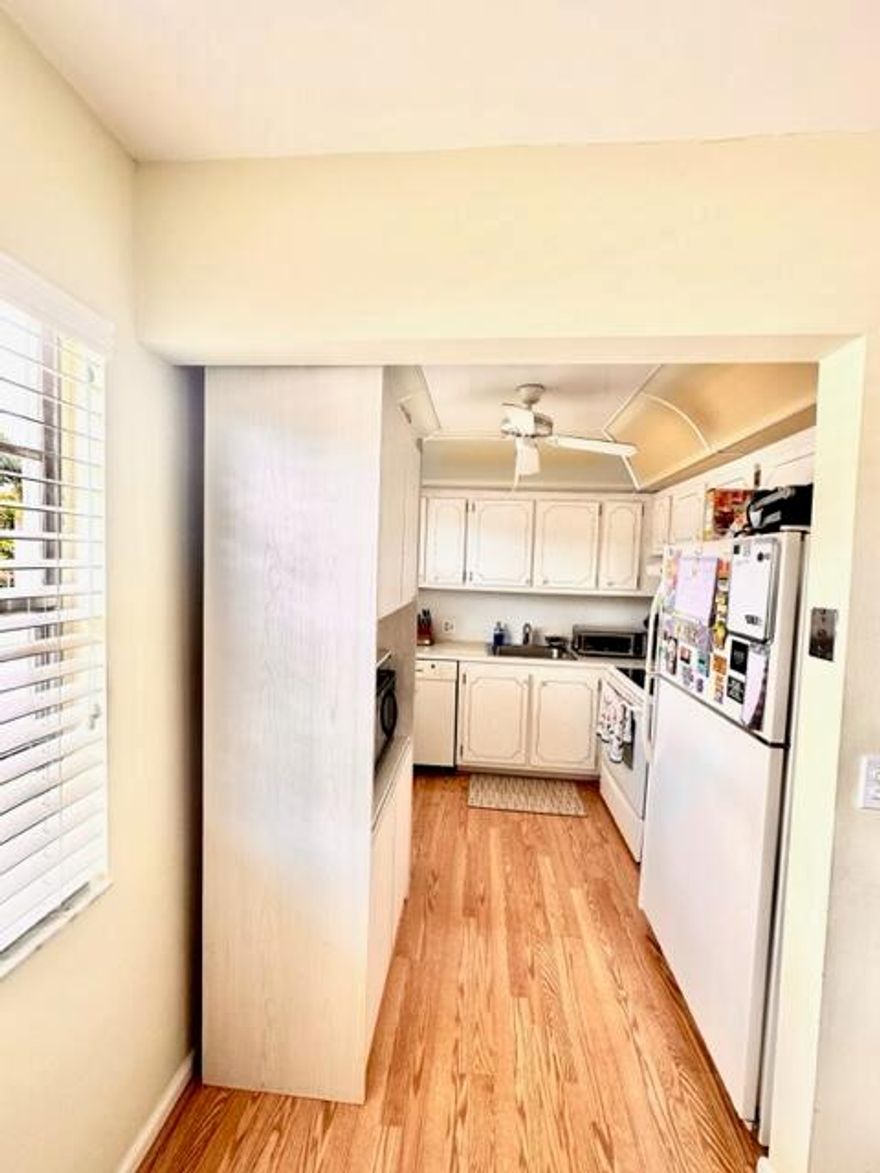 2/1.5, 2nd floor,Outside corner, wood look floor,no popcorn on ceiling - smooth finish, shower, - no tub, AC 6 years and hot water heater 4 years, screened patio w/lake view to the right.The amenities include internet and WIFI, Century Village is like living in a resort, fitness center, live shows,movies,buses,classes,bingo,card rooms,trips,tennis,close to shopping and restaurants,come see and then check out the clubhouse to see it for yourself. Per the association this is a 55 plus community!!!