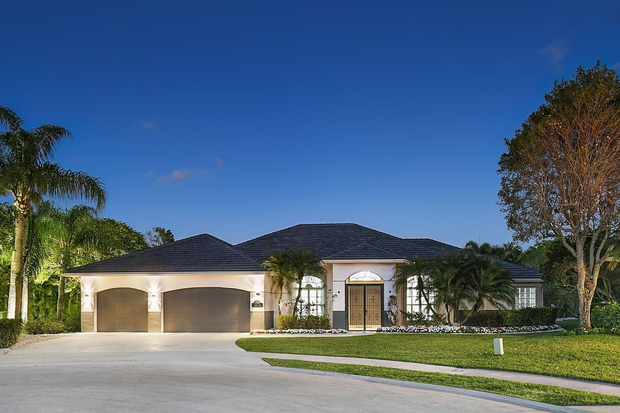 This lovely home, redesigned to be a peaceful retreat, is just a short distance from the horse show. It sits on about 1/2 acre of land, offering privacy and great views of the golf course. With six bedrooms and four bathrooms, the house varies with a modern style and covers 3,352 square feet. The main living areas have stunning pool views, blending indoor and outdoor spaces perfectly. The property also includes a spacious three-car garage with lots of storage space. Everything in the house has been updated, including the roof, appliances, kitchen, flooring, and lighting. Located in a quiet cul-de-sac, this home backs onto the golf course, making it even more peaceful.