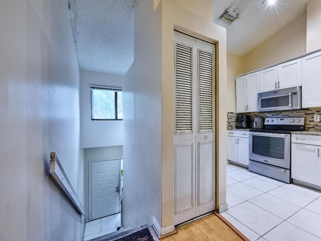 Photo of 305 Harbour Pointe Way, Greenacres, FL 33413 (MLS # R11127617)