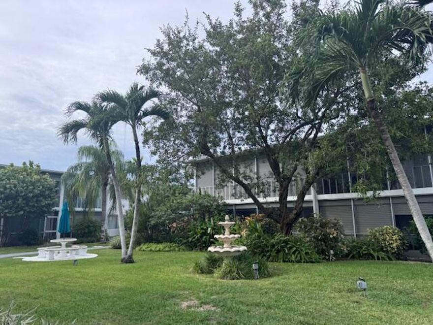 Updated 2 Bed  1 Bath Annual Rental in Lighthouse Point. Available for annual non-renewing lease, this first-floor residence is in excellent condition--well maintained, spotless, and move-in ready. Internet, cable, water, garbage included. Furniture is optional and negotiable.  Laundry facilities onsite. The unit has a nice open kitchen, modern bathroom, and nice tile flooring. Large windows bring in natural light and offer tropical views. Private screened porch. Well maintained building that has passed its 40-year inspection. Roof is (2022).  Nestled on a charming street, all ages are welcome. Amenities include a heated saltwater pool, pickleball court, clubhouse, outdoor kitchen/BBQ area, picnic tables, car wash, designated and guest parking. Service animals with appropriate paperwork.