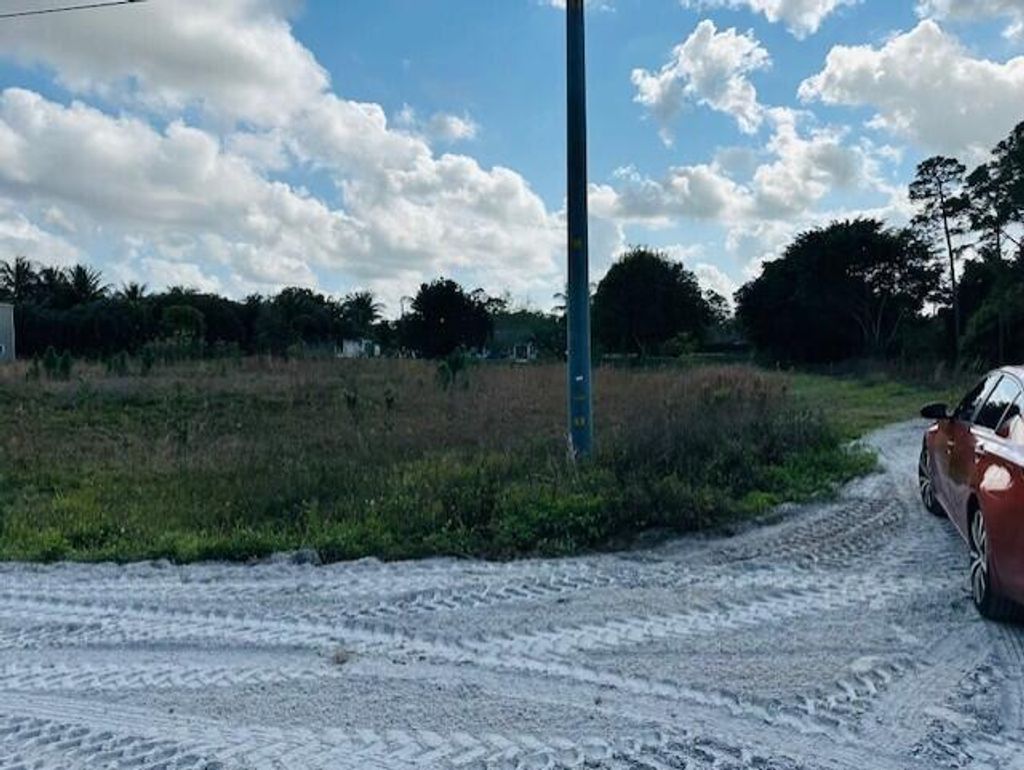 Photo of 13714 71st Place N, West Palm Beach, FL 33412 (MLS # B26006612)