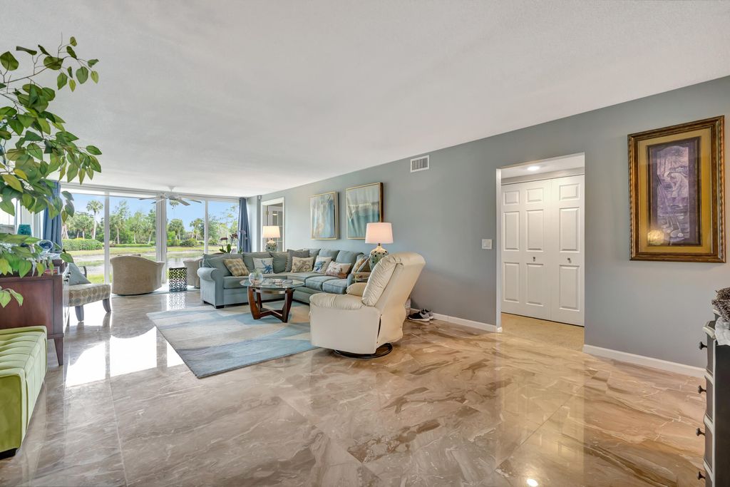Photo of 4680 SW Parkgate Boulevard #C, Palm City, FL 34990 (MLS # B26025044)