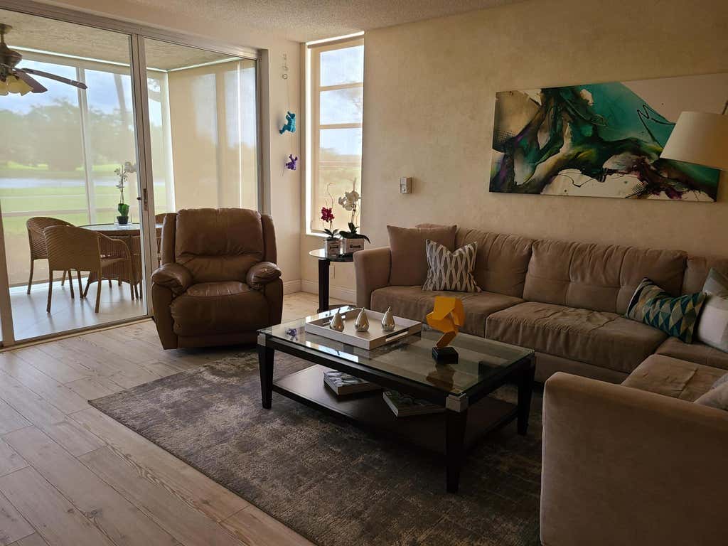 Photo of 804 Cypress Boulevard #104, Pompano Beach, FL 33069 (MLS # B26043411)