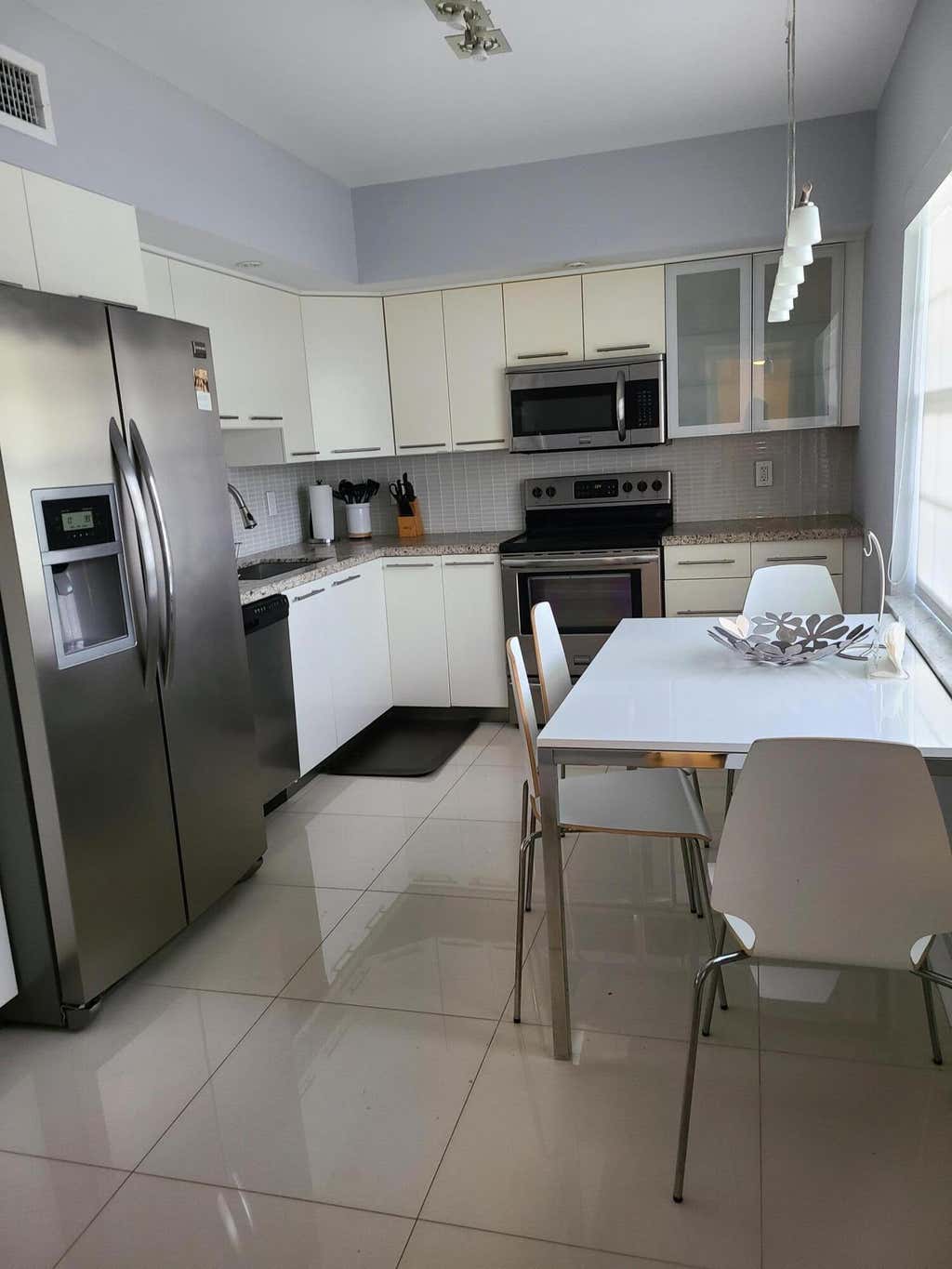 Photo of 804 Cypress Boulevard #104, Pompano Beach, FL 33069 (MLS # B26043411)