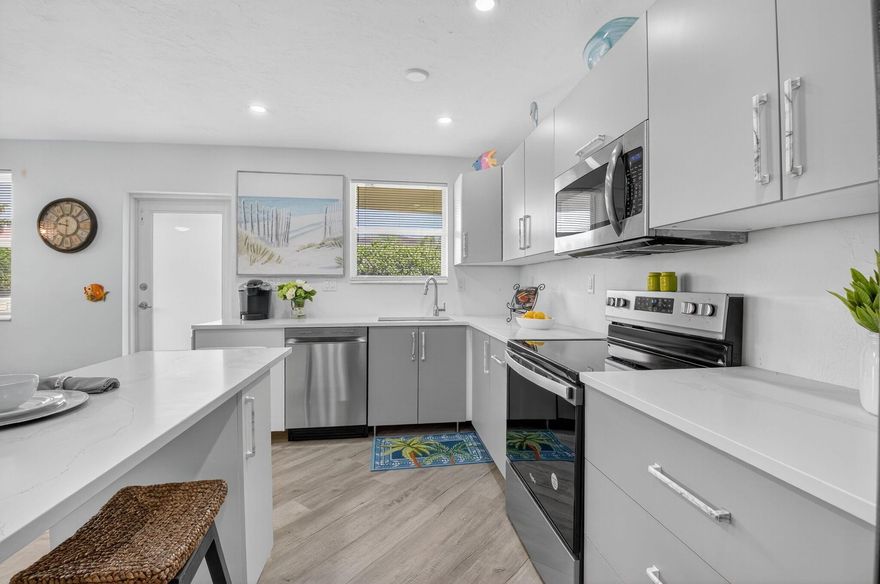 LOCATION, LOCATION, LOCATION ! UNBEATABLE SPOT IN BOCA ACROSS THE STREET FROM THE OCEAN, WITH PRIVATE BEACH ACCESS ALONGSIDE LUXURIA. SHORT DISTANCE TO DEERFIELD BEACH PIER & RESTAURANTS. OSCEOLA ARMS IS A BOUTIQUE BUILDING OF ONLY 12 UNITS & HAS LOW HOA FEES. THIS SECOND FLOOR UNIT HAS AN UNBELIEVABLY, SPACIOUS FLOOR PLAN WITH OPEN KITCHEN/LIVING ROOM & AN EXTRA-LARGE BEDROOM WITH DOUBLE CLOSETS. FRESHLY RENOVATED UNIT WITH NEW KITCHEN CABINETS, QUARTZ COUNTERS, CENTER ISLAND, RECESSED LIGHTING, NEW BATHROOM, TILE SHOWER, NEW ELEC PANEL, PLANK FLOORING THROUGHOUT, IMPACT WINDOWS & DOORS, AND SCREENED PORCH & HVAC. THIS PARTIALLY FURNISHED BEACH OASIS IS FULLY EQUIPPED WITH KITCHEN, POTS, PANS, DISHES, BEDDING, TOWELS, & LINENS. BRING YOUR BATHING SUIT!