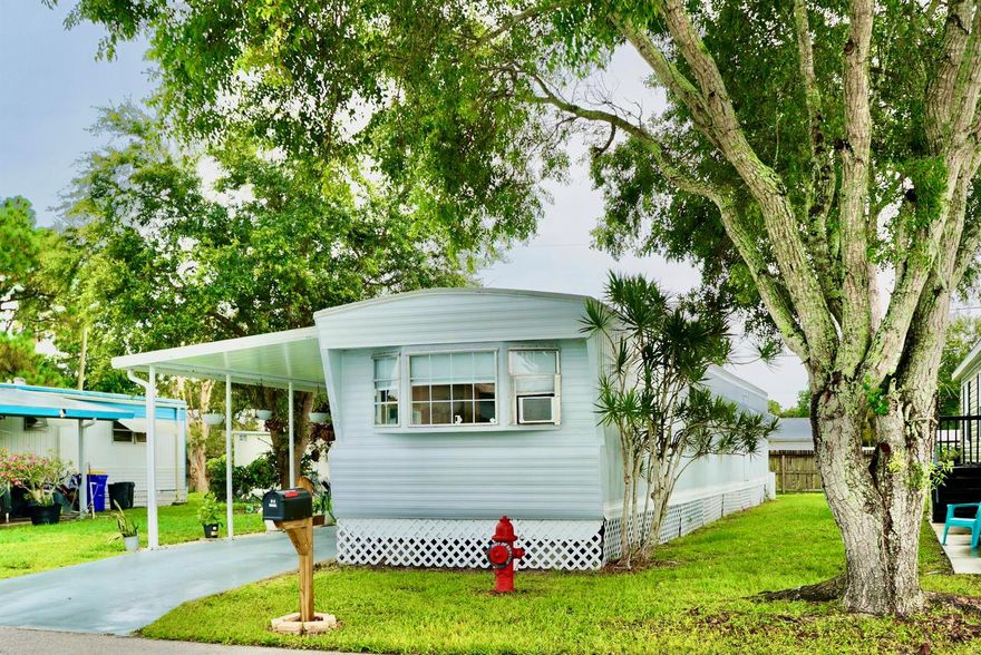 Back on market due to buyer approval only. ALL AGE Community! PETS WELCOME! Completely Remodeled! Drywall throughout New Flooring throughout. Beautifully remodeled, spa-like bathrooms. Two bedrooms on opposite sides of home creating private space for each. Large 200sf porch / Florida room for extra entertaining space. Screens have just been replaced. Roof was waterproofed two years ago.  Home backs up to green space, so there is no home behind you. This is a MUST SEE.This land leased home sits just off Federal Hwy in a private quiet park. Close to restaurants, hospital, shopping and BEACH.  $923 land lease pays for lawn maintenance, basic cable, trash pick up and PROPERTY TAXES. Park amenities include, swimming pool, playground, and shuffle board. Call today to for a private tour.