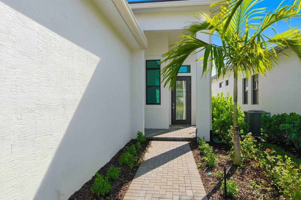Photo of 12508 SW Lunata Way, Port Saint Lucie, FL 34987 (MLS # R11143422)