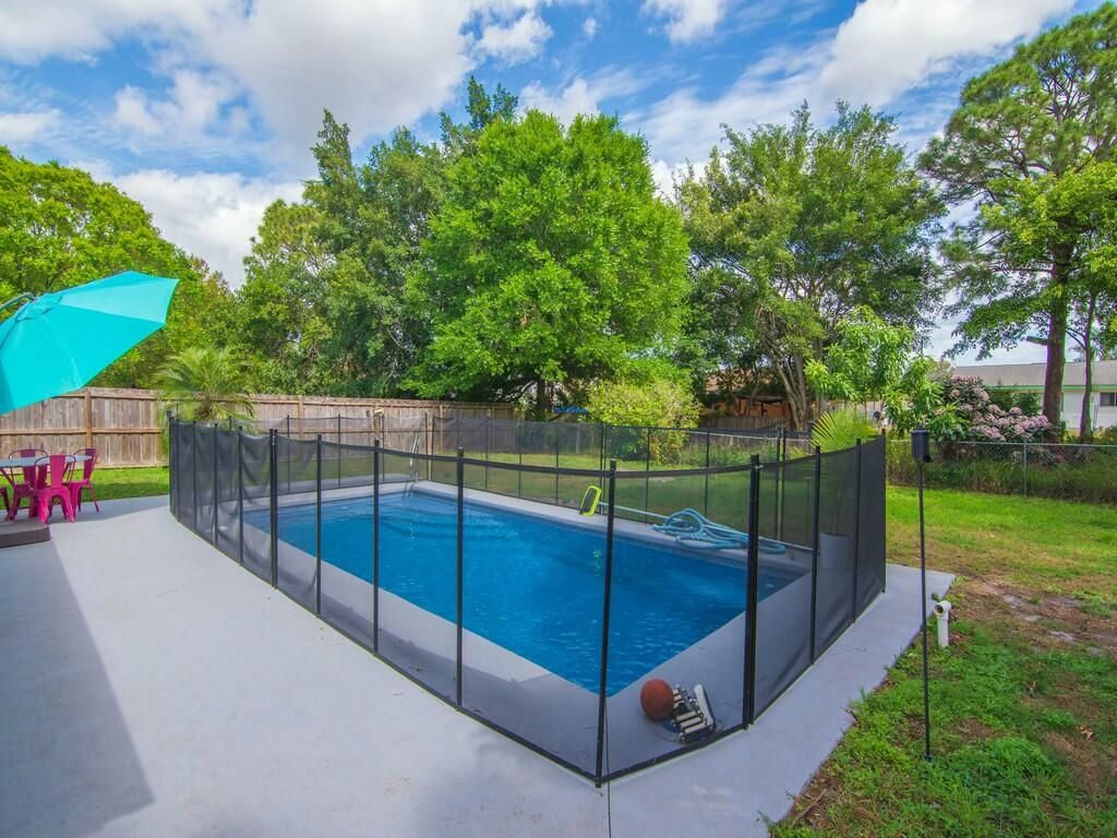 Photo of 2271 SE Aneci Street, Port Saint Lucie, FL 34984 (MLS # R11065566)