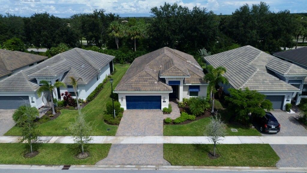 Photo of 12615 SW Sunrise Lake Terrace, Port Saint Lucie, FL 34987 (MLS # B26080755)