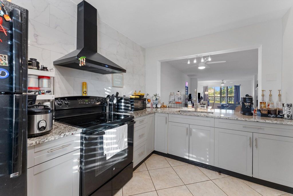 Photo of 3050 NW 42nd Avenue #C204, Coconut Creek, FL 33066 (MLS # R10958976)