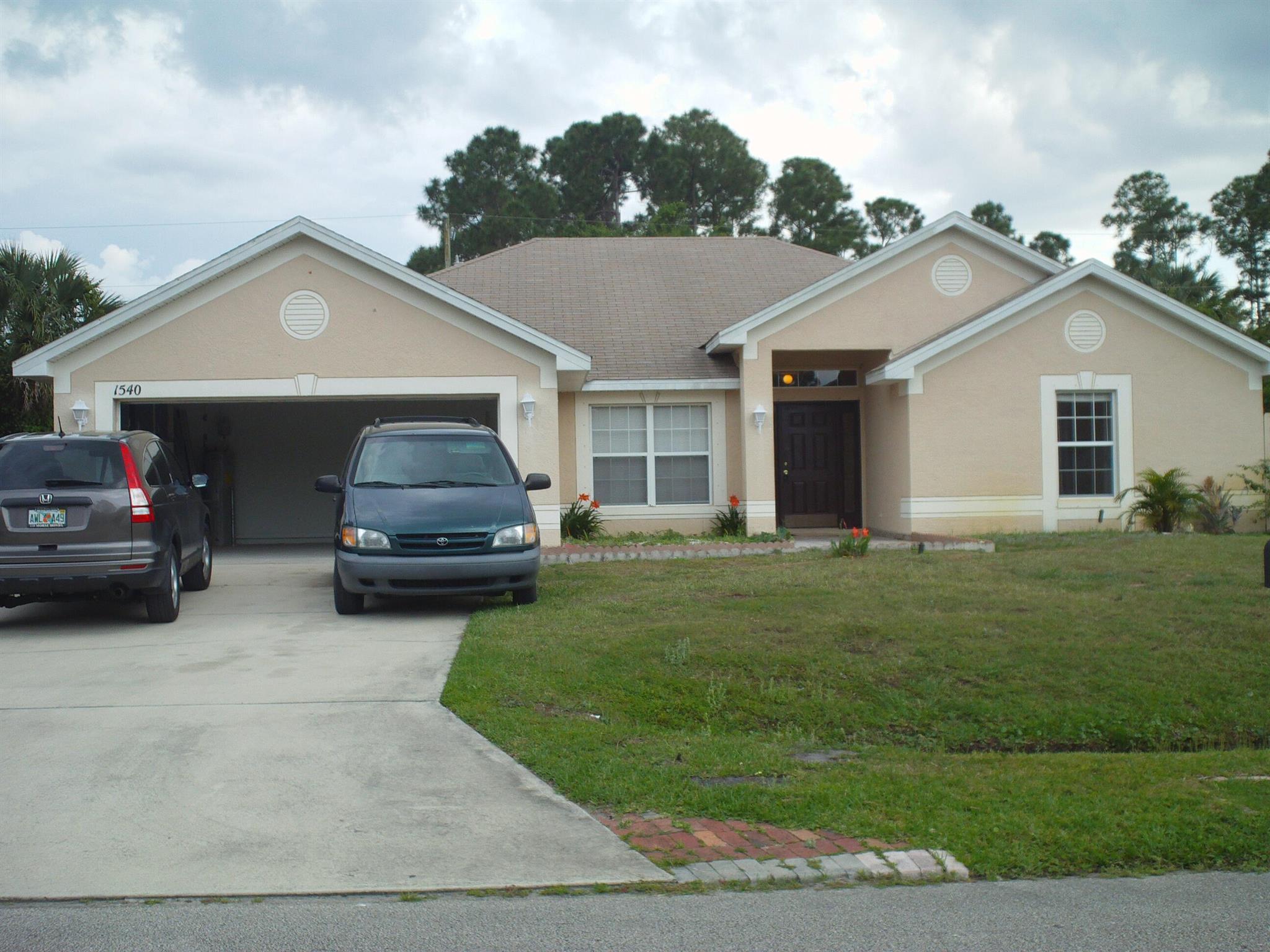 Beautiful 4Bd/3ba/2Ga house built in 2004. Spacious and private with wood fence. Large vaulted family room with huge separated dining area. Split bedrooms. Large master bath with dual sinks, walk-in closet and linen closet. Tile throughout whole house. Convenient location close to I-95 and gatlin/becker. Vacant and move in ready.