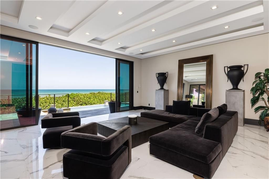 Photo of 7900 S Ocean Drive, Jensen Beach, FL 34957 (MLS # R11090294)