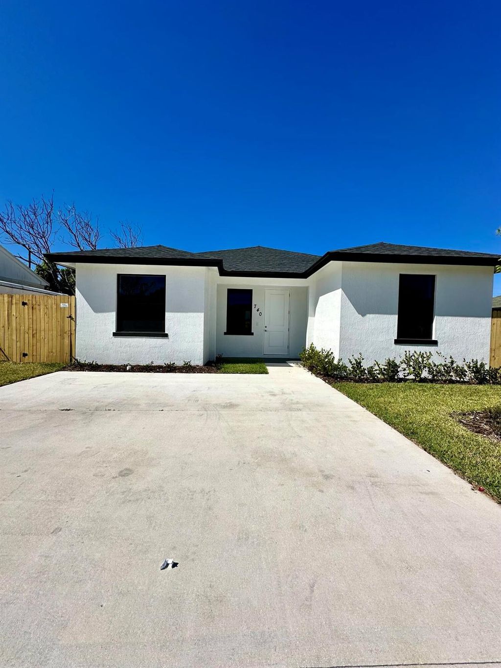 Photo of 740 W 3rd Street, Riviera Beach, FL 33404 (MLS # R10979792)