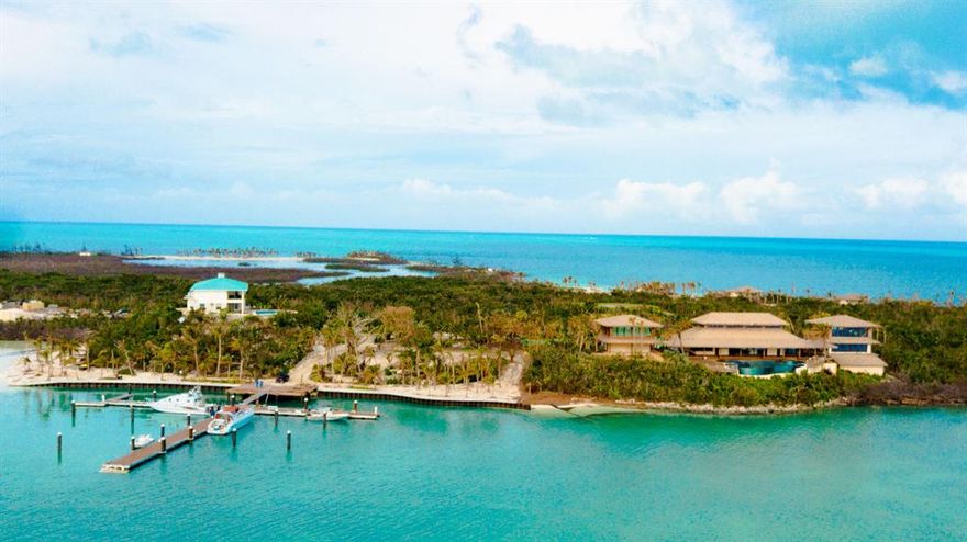 A private estate multiple island compound of this caliber – with these amenities and substantial infrastructure rarely becomes available. Approximately 277 acres consisting of one main island, and eight adjoining islands such as Seahorse Cay, Bakers Cay, Sandy Cay, Felix Cay, Mermaid Cay and Sponger's Cay- all freehold with some long term leasehold islands combine to yield the utmost in privacy and ample options for future development. Frequented by pirates in the 16th Century   who's cannons and empty treasure larder were discovered near one of its pristine white sand beaches, Big Grand Cay eventually became a retreat for wealthy inventor Robert Abplanalp and his best friend, the 37th US President Richard M. Nixon. Purchased in 2015 and completely transformed into a "5 Star" retreat. Amenities include two beautifully appointed main residences and eight luxurious cottages   each with breathtaking views. At the main islands core is the Great House- the family gathering center with its own huge glass tiles pool with swim outs, all overlooking the entry marina and natural rock outcroppings. Adjacent to that is the main dining room and in another building within the complex, a world class gym   all with stunning turquoise views. Serviced by a professionally equipped stainless steel kitchen with walk-in freezers, pizza ovens etc.
The quality of the interior finishes are equal to the best seen in Palm Beach or Beverly Hills using craftspeople flown in for their unique specialty. The marbles, hardwoods and fittings are all the very best money can buy   with equally luxurious furnishings   no expense spared and every detail attended to. Moreover, each home or guest villa has its own personality   from Asian to "Tommy Bahama" to contemporary. The original 1950's coral stone home also has been updated   but still features the "Nixon" bedroom and library, and several former Secret Service dwellings remain for storage and future use.
Infrastructure includes generators which power the entire compound, de-salt plant for ample fresh water, outstanding storage buildings, three complete homes for staff and a dormitory building which can accommodate several dozen people with a full kitchen, gathering area and dining hall. A commercial loading dock an ancillary marina is nearby for deliveries.
These islands are a short boat ride over living coral reefs from world famous fishing destination Walkers Cay, and is lushly landscaped with exotic hardwoods, bougainvillea, orchids and palms   including hundreds of mature coconut palms lining the beaches. Tennis, pickle ball, basketball and athletic courts add options for your family and guests and a complete array of "toys" come with this purchase.
This is a special opportunity to own your dream   a private island retreat for family, friends or corporate use. Easy access by plane or by yacht with quality roadways around the main island which put multiple beaches and unmatched beauty at your fingertips. Memories of a lifetime and an opportunity to get away from the world   without loss of a single comfort or modern convenience, await.