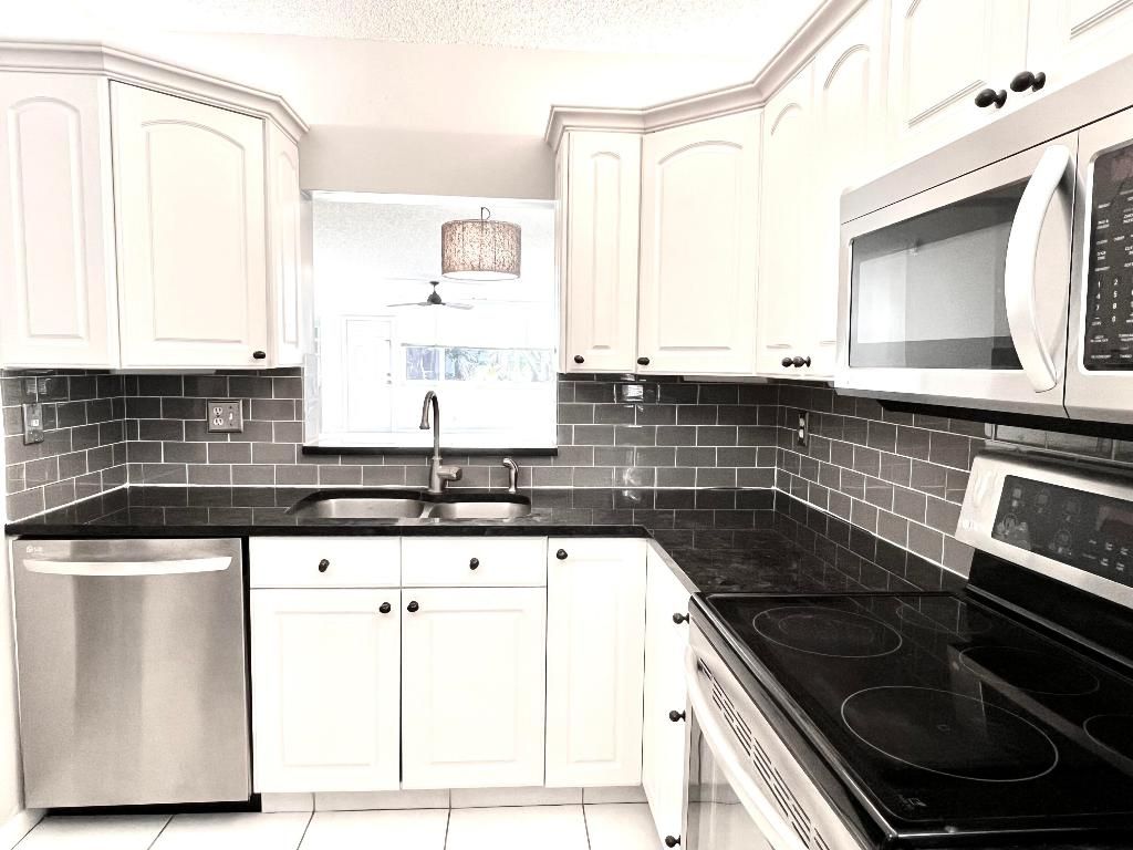 Photo of 2865 SW 22nd Avenue #108, Delray Beach, FL 33445 (MLS # R11143950)