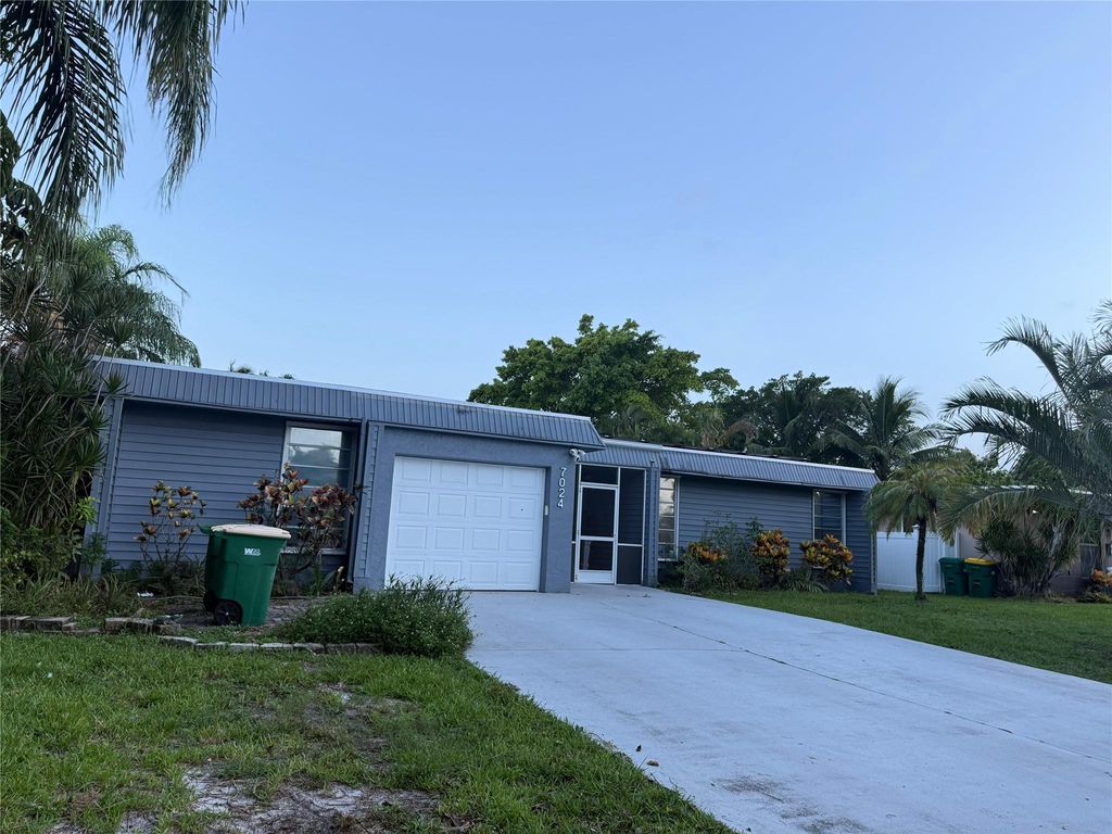 Photo of 7024 NW 63 Street, Tamarac, FL 33321 (MLS # F10518730)