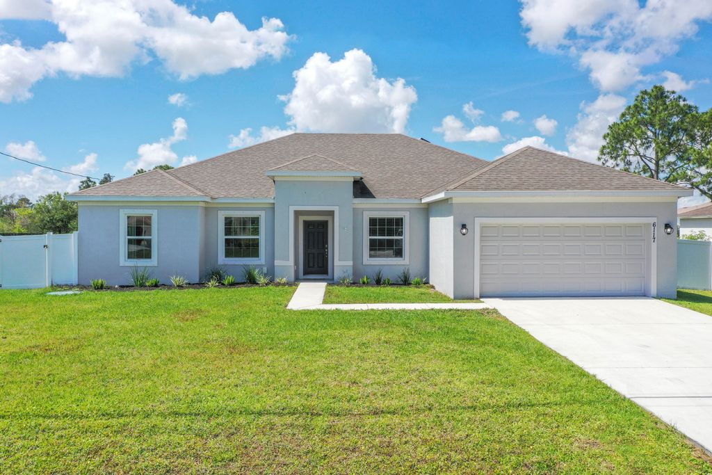 Photo of 6117 NW Duke Circle, Port Saint Lucie, FL 34983 (MLS # B26018984)