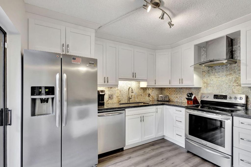 Photo of 1109 11th Terrace, Palm Beach Gardens, FL 33418 (MLS # R10975546)