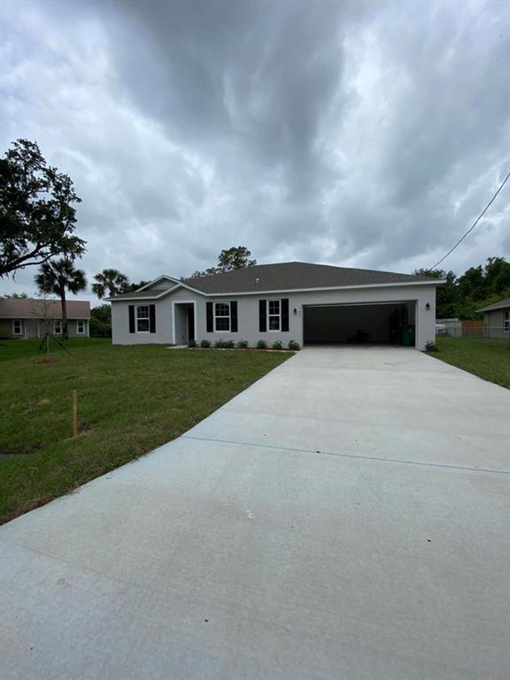 Photo of 702 SW Aster Road, Port Saint Lucie, FL 34953 (MLS # R10788330)