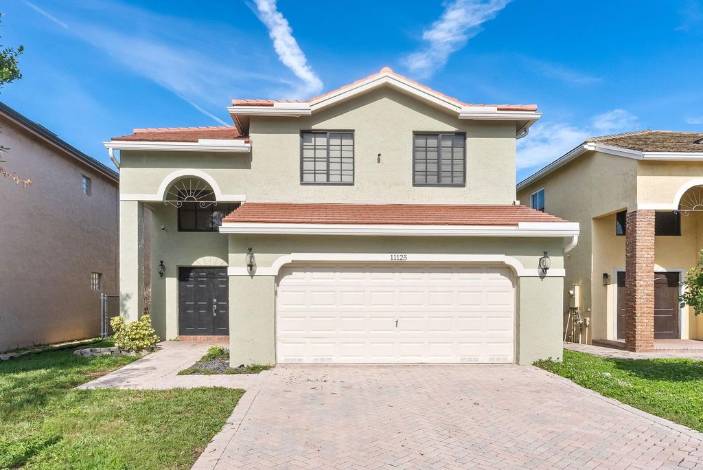 Photo of 11125 NW 34th Ct, Coral Springs, FL 33065 (MLS # F10541191)