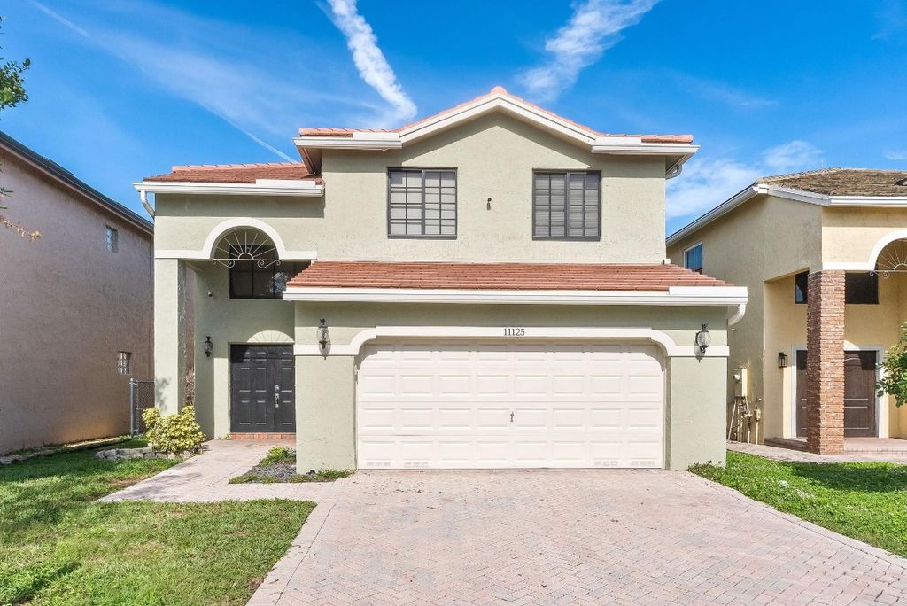 Photo of 11125 NW 34th Court, Coral Springs, FL 33065 (MLS # F10541191)