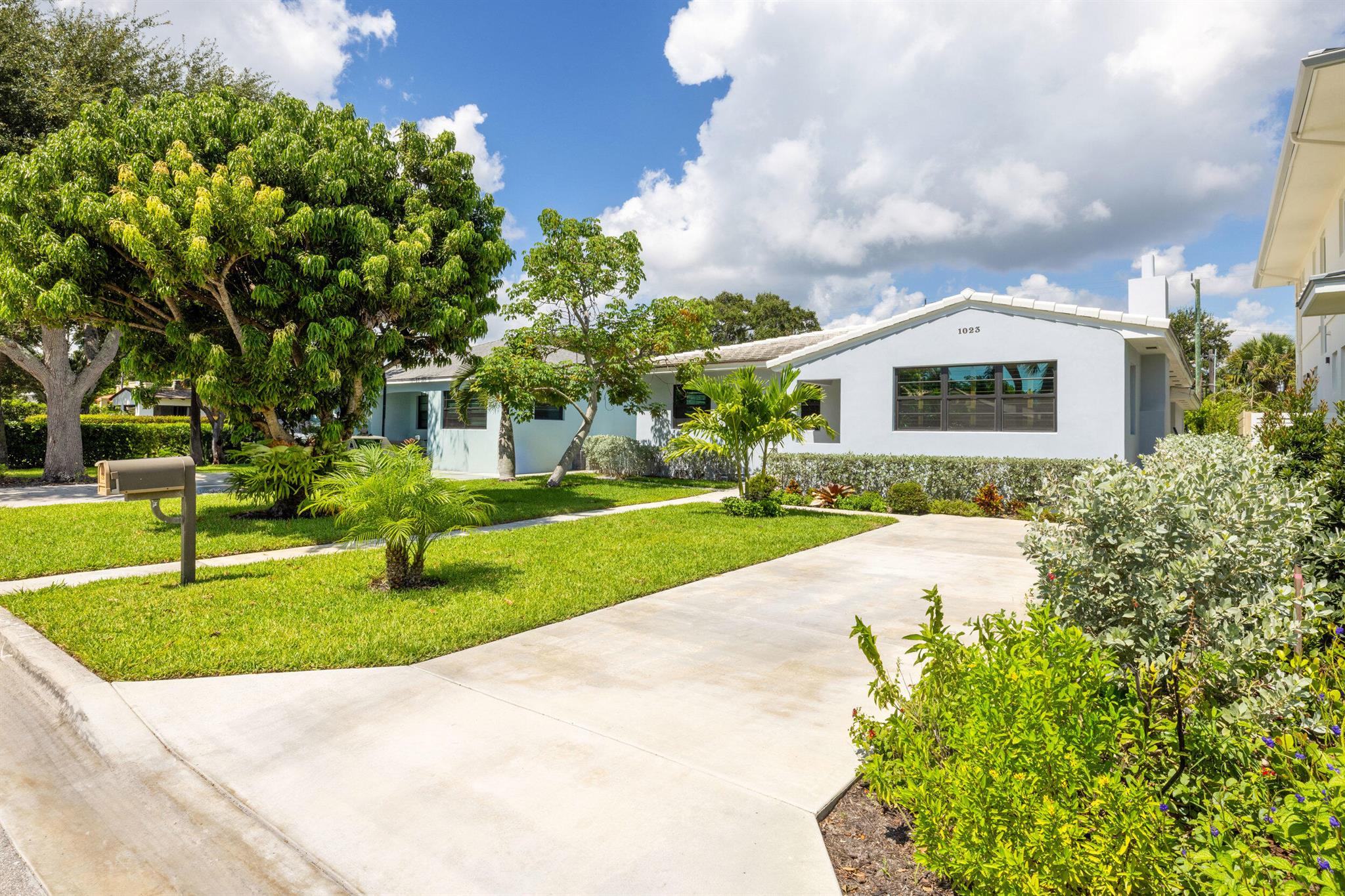Enjoy the best of coastal living just two blocks from the Intracoastal in this beautifully updated 4BR/2.5BA home in Lake Worth Beach's historic South Palm Park! Surrounded by native landscaping, this charming single-story residence features a spacious open family room, updated kitchen and baths, and a beautiful primary suite with a walk-in closet and ensuite spa like bath featuring a walk-in shower. Step outside to your private backyard oasis with a heated pool, manicured lawn, and off-street parking. A rare gem near the waterfront--don't miss this opportunity!