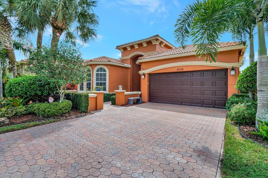 This is what you've waited for - this stunning waterfront home located on a quiet street has it all!  From the moment you walk through the double entry etched glass doors of this impeccable home you'll see what makes it so special.  This home features a captivating open floor plan, high volume ceilings, a tranquil water view, WHOLE HOUSE GENERATOR (2021), IMPACT GLASS (front & rear), accordion hurricane shutters, NEW water heater (2021), NEW comfort height toilets (2020), French doors off primary suite & family room, crown molding, and so much more.  The kitchen will impress you w/ its oversized island w/ bar seating, NEW appliances (2020/2022), NEW large stainless steel kitchen sink & faucet, stone backsplash, granite counter tops & an abundance of cabinets & storage space. Other amazing features include a Closets by Design closet in the primary suite, custom window treatments, custom quality built-ins in the den & family room, a Murphy bed in the guest bedroom - perfect for family when they visit, high-hat LED lighting with dimmers, tile set on the diagonal, wood flooring in the bedrooms & den and a doorbell camera.

You'll be delighted with the newly extended screened-in lanai with a new screen enclosure built to perfection with the upper section offering "Panoramic Views" and pet screen on the bottom.  The patio is accompanied by professionally installed outdoor accent lighting and upgraded landscaping that enhances your privacy and provides the perfect setting for you to enjoy your morning coffee or a nice glass of wine as you watch the breathtaking sunsets.  It's your own tropical paradise! 

* The den/office can be used a 3rd bedroom as it has a closet and window.

Buena Vida is Wellington's premier boutique 55+ active community offering a renovated clubhouse and marvelous amenities such as: Resort Style Pools, Cafe, Spa, Sauna, 6 Har-Tru Tennis Courts, 4 NEW Pickle Ball Courts, State of the Art Fitness Center, Library, Card Rooms, Billiard Room and entertainment in the luxurious Ballroom - just to name a few! Offering the BEST location in Wellington, Buena Vida is just minutes to great restaurants, shopping, entertainment, Wellington International Equestrian events, parks and top-notch medical facilities, yet also close to the beaches, cultural venues, downtown areas & PBI International Airport. Luxuries abound in this well-manicured community with all the indulgence you deserve.