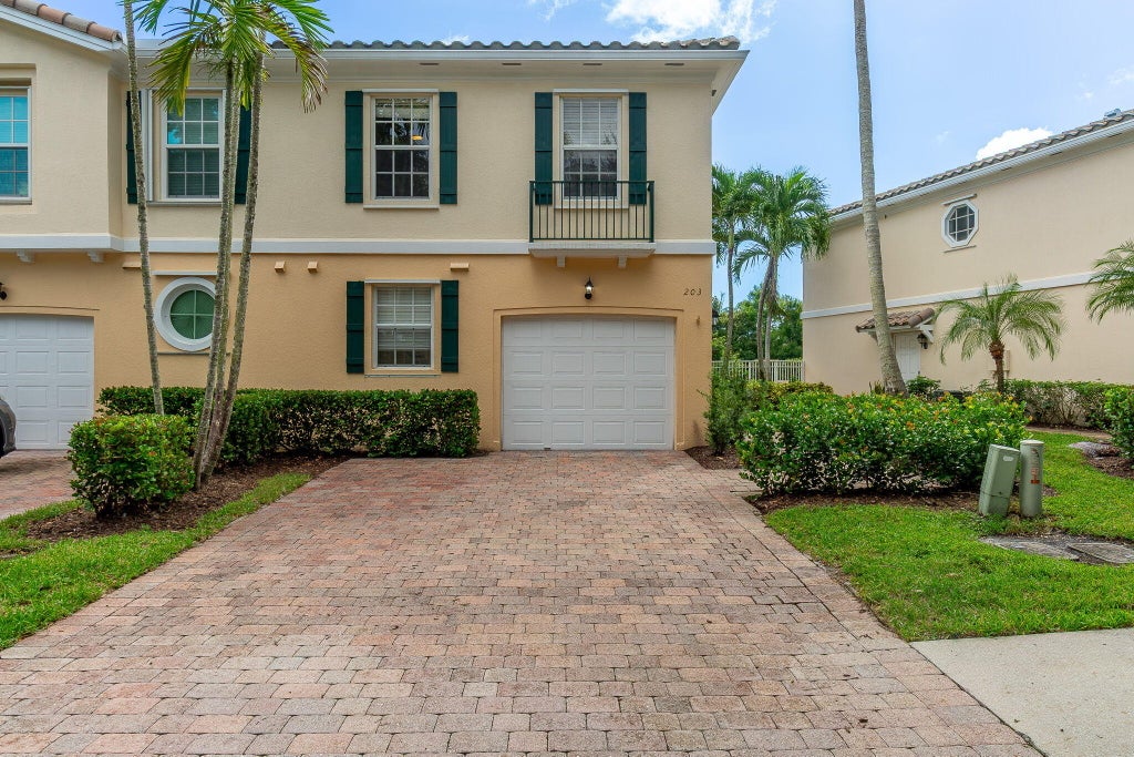 Photo of 203 FORTUNA Drive, Palm Beach Gardens, FL 33410 (MLS # B26087806)