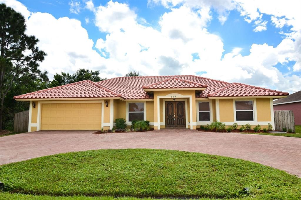 Photo of 558 SW Colleen Avenue Avenue, Port Saint Lucie, FL 34983 (MLS # R10658308)