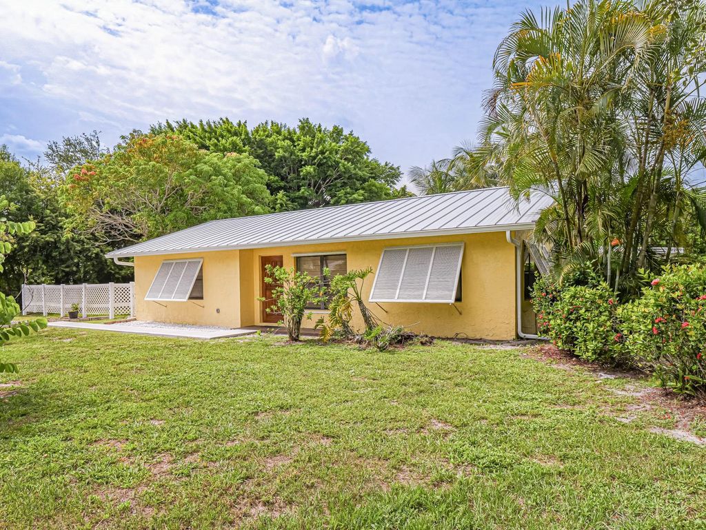 Photo of 502 SW Sansom Lane, Port Saint Lucie, FL 34953 (MLS # F10452512)