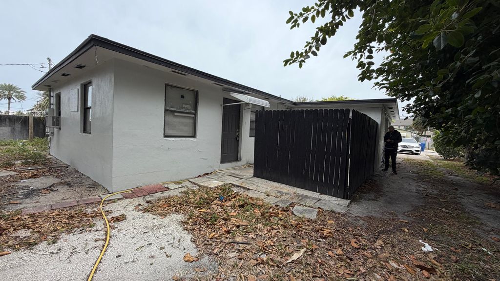 Photo of 34 W 34th Street, Riviera Beach, FL 33404 (MLS # R11159639)