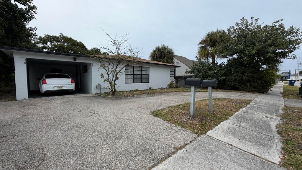Photo of 34 W 34th Street, Riviera Beach, FL 33404 (MLS # R11159639)