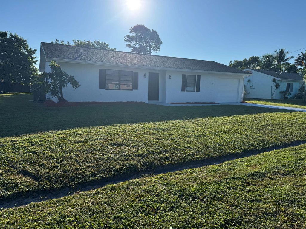 Photo of 2251 SE Holland Street, Port Saint Lucie, FL 34952 (MLS # R11116651)