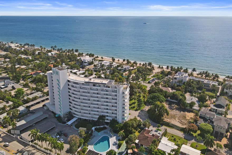 Beachfront home & the only TURN KEY top floor unit @ SeaTower!  Mint condition! Move-in ready w panoramic ocean views from the open-concept layout to the floor to ceiling impact windows & doors. Modern kitchen boasts stainless appliances & granite countertops. Large, private 26 ft. terrace for entertaining- sure to wow!  Over-sized walk-in closet & guaranteed extra storage area. Highlights: 2 min. walk to the beach, 5 min walk to restaurants & bars on the Intracoastal, shops, Publix, & Birch State Park bike trails.  Resort-like amenities including pool, BBQ area, gym, and bike room.  Assessments done and fully paid.