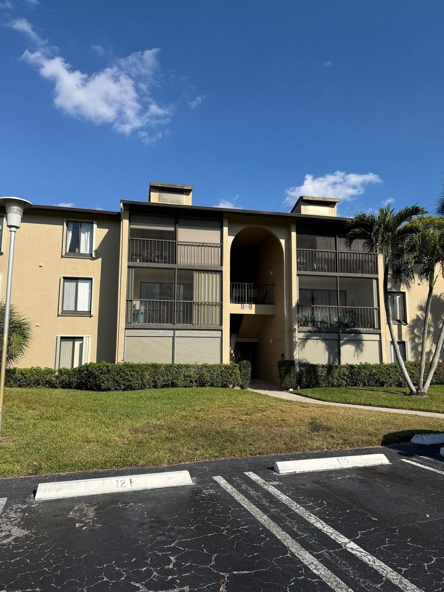 Enjoy the private view from your balcony from this large condo home. Newly installed Kitchen cabinets and countertops. Community amenities include a pool, tennis courts, and shuffle board. Close to shopping, restaurants, and entertainment.