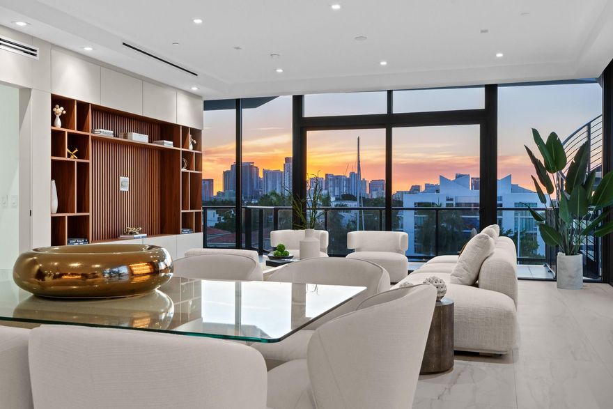 Live in one of the most stunning condos in Fort Lauderdale, the Penthouse at Casa Murano delivers an unparalleled living experience. Premium 50 x 15 boat slip included. Large open floor plan lives like a private villa on the water. 3 Bed+ Office/4.5 Bath. Designed with exquisite finishes including chef's kitchen by Mia Cucina, wolf and subzero appliances, wet bar, custom closets and built-ins. Floor to ceiling windows and doors throughout with views of the waterways, downtown skyline, and stunning sunsets. Wraparound balcony and spiral staircase to private rooftop terrace complete with hot tub and summer kitchen. Spa-like primary suite with sunset exposure and water views, marble clad bathroom with soaking tub, rain shower, dual sinks and separate vanity, and extra large walk in closet.