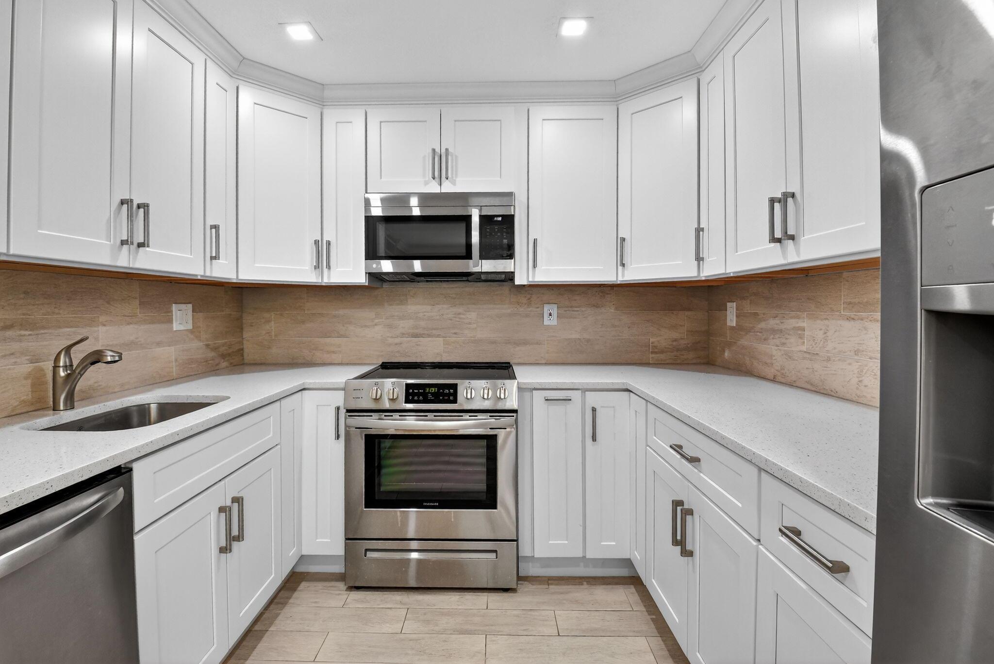 RENT IMMEDIATELY after purchase. Stunning redone ground floor unit. Fancy horseshoe kitchenperfect for someone who likes to cook. Walk in shower and spaceious rooms.