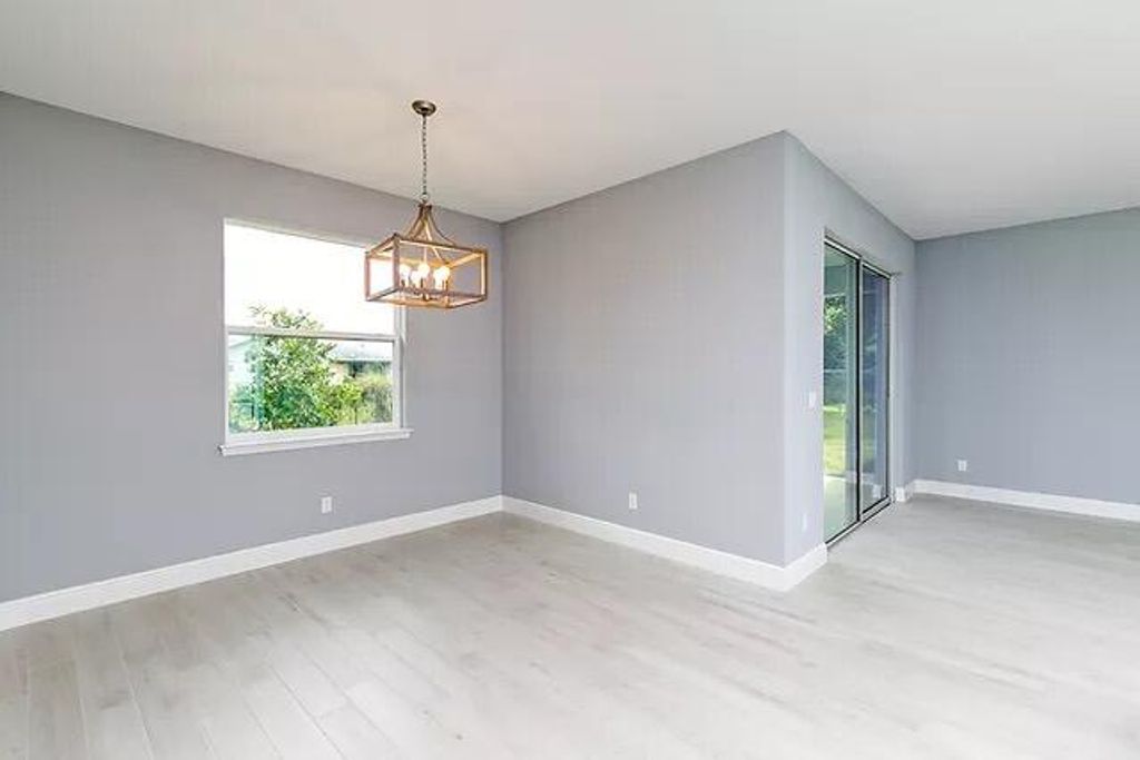 Photo of 3673 SW Masilunas Street, Port Saint Lucie, FL 34953 (MLS # R11159777)