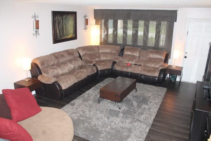 VERY LARGE 4 BEDROOM 2.5 BATH TOWHHOME.   MASTER BEDROOM AND ANOTHER LARGE BEDROOM DOWNSTAIRS, TWO BEDROOMS UPSTAIRS.  TILE THROUGHOUT LIVING AREA, SEPARATE DINING AREA, EAT IN KITCHEN, LARGE LIVING ROOM,  SEPARATE LAUNDRY ROOM, MANY STORAGE CLOSETS. PRICED RIGHT, EASY TO SHOW