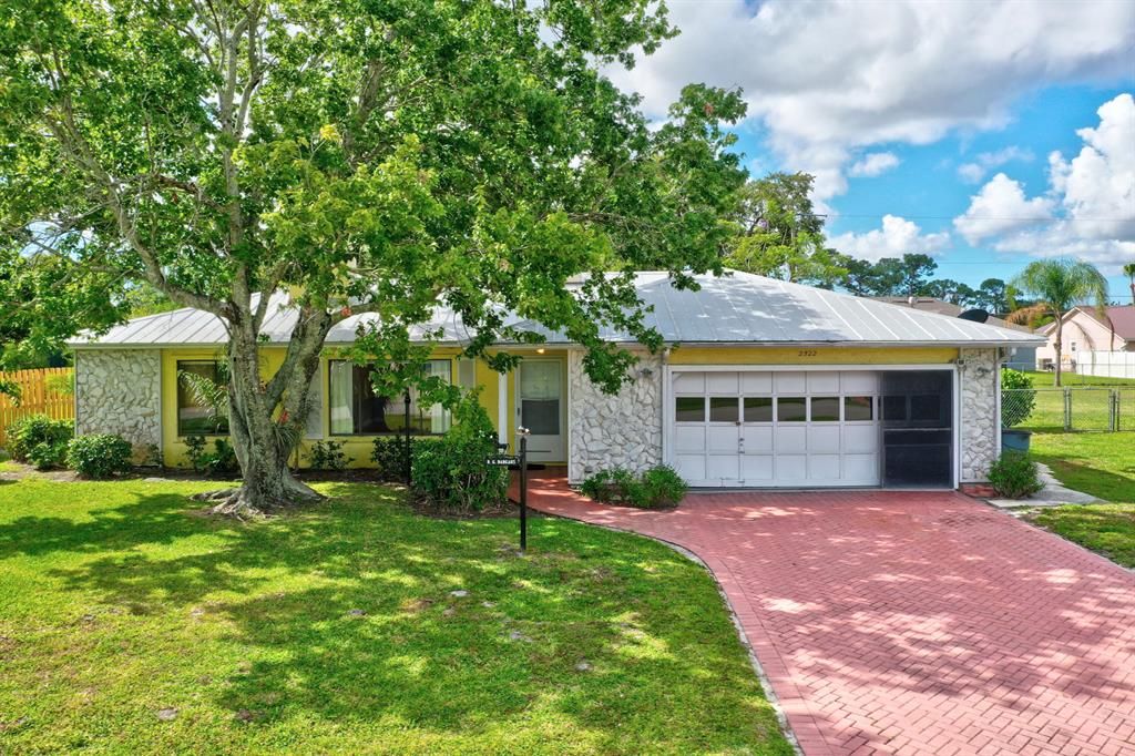 Photo of 2522 SE Calusa Avenue, Port Saint Lucie, FL 34952 (MLS # R10801527)