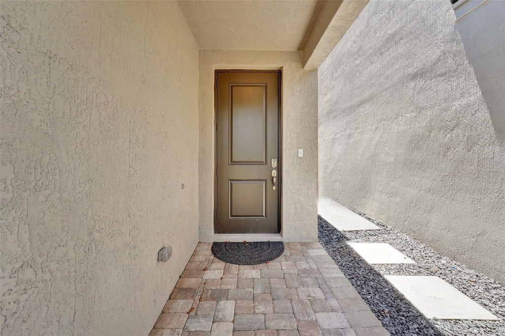 Photo of 392 NW 36th Avenue, Pompano Beach, FL 33069 (MLS # F10452070)
