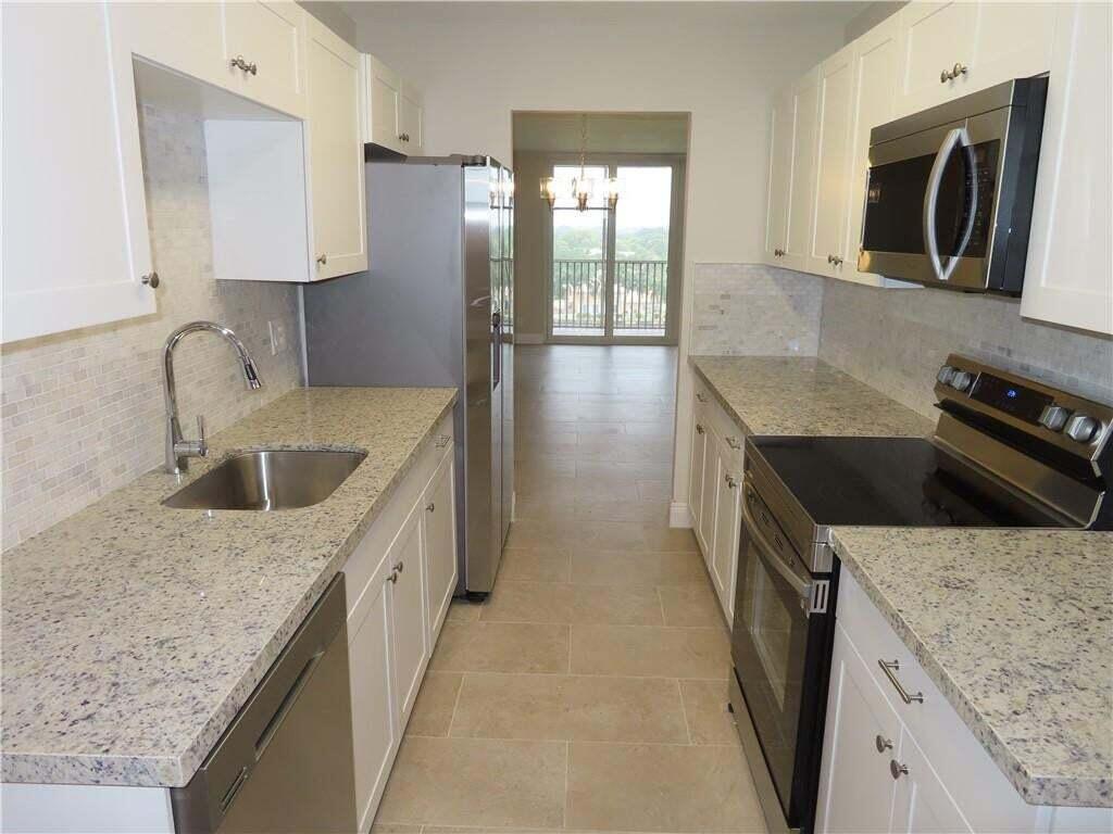 Photo of 250 JACARANDA Drive #810, Plantation, FL 33324 (MLS # B26081650)