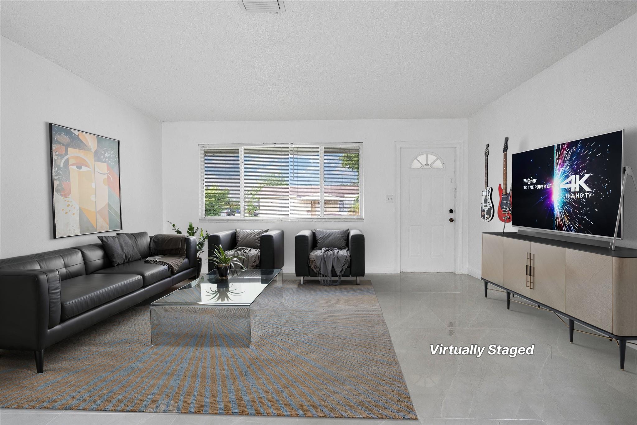Fully renovated and move-in ready, this 3-bedroom, 2-bathroom home sits on a corner lot with ample room to add a pool in the fenced backyard. Inside, you'll find gleaming marble tile floors throughout, built-in shelving, and a modern kitchen featuring granite countertops and stainless steel appliances. Both bathrooms are finished with floor-to-ceiling tile, and the home includes a full-size washer and dryer. This low-maintenance property offers flexibility with no HOA fees or restrictions—ideal for pet owners, those with recreational vehicles, or investors seeking immediate rental opportunities. Just minutes from I-95 or an easy drive to North Hollywood Beach Park. Minutes to shopping and more. Bundled service pricing available for buyers. Connect with the listing agent for details.