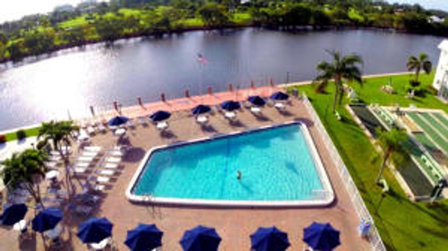 Fantastic Resort Style Intracoastal Community. 2 Bedroom, 2 Bath, Furnished, 2 Sleeper Sofas Features Hurricane Impact Windows,Crown Moldings, Wood Floors, Newer A/C & Hot Water Heater. Exterior of the Buildings just painted. Clubhouse has been Remodeled & Salt Water Heated Pool on the Intracoastal! Minutes to Tropical Beach & Trendy Downtown Delray Beach! Colonial Club offers a lifestyle that, for most people is a memory. Over twenty-two acres of rich, thickly-planted land surrounded on one side by a brick wall, Colonial Club Community is a return to gracious spacious living. Hugging the Intracoastal Waterway. There are a total of 504 Condominiums in Colonial Club Boynton Beach, Palm Beach County, 
Colonial Club Condos lies outstretched beneath a clear sky beside a blue sparkling waterway with Palm Beach just north and exclusive Delray Beach/Boca Raton just south. When the spirit moves you, you'll find no better place than Boynton lovely Beach and warm ocean waters for swimming, sailing, fishing, boating or just plain soaking up the sunshine. There are six 18 hole golf courses in the immediate Boynton Beach area, all among the top rated golf courses in the country. Also near by for your convenience are modern shopping centers, a wide variety of restaurants: theaters:Bethesda Hospital. And when home is where you're bound, Colonial Club gives you land, lots of land under sunny and starry skies above with activities that you love... and wraps it up in a very secure, very private,very carefree living The gift of a life time (if you believe in dreams coming true). Clubhouse has been beautifully completely remodeled & heated pool has been converted to a Saltwater pool Located on the Intracoastal !!!!! Minutes to Tropical Beaches & Trendy Downtown Delray Beach!